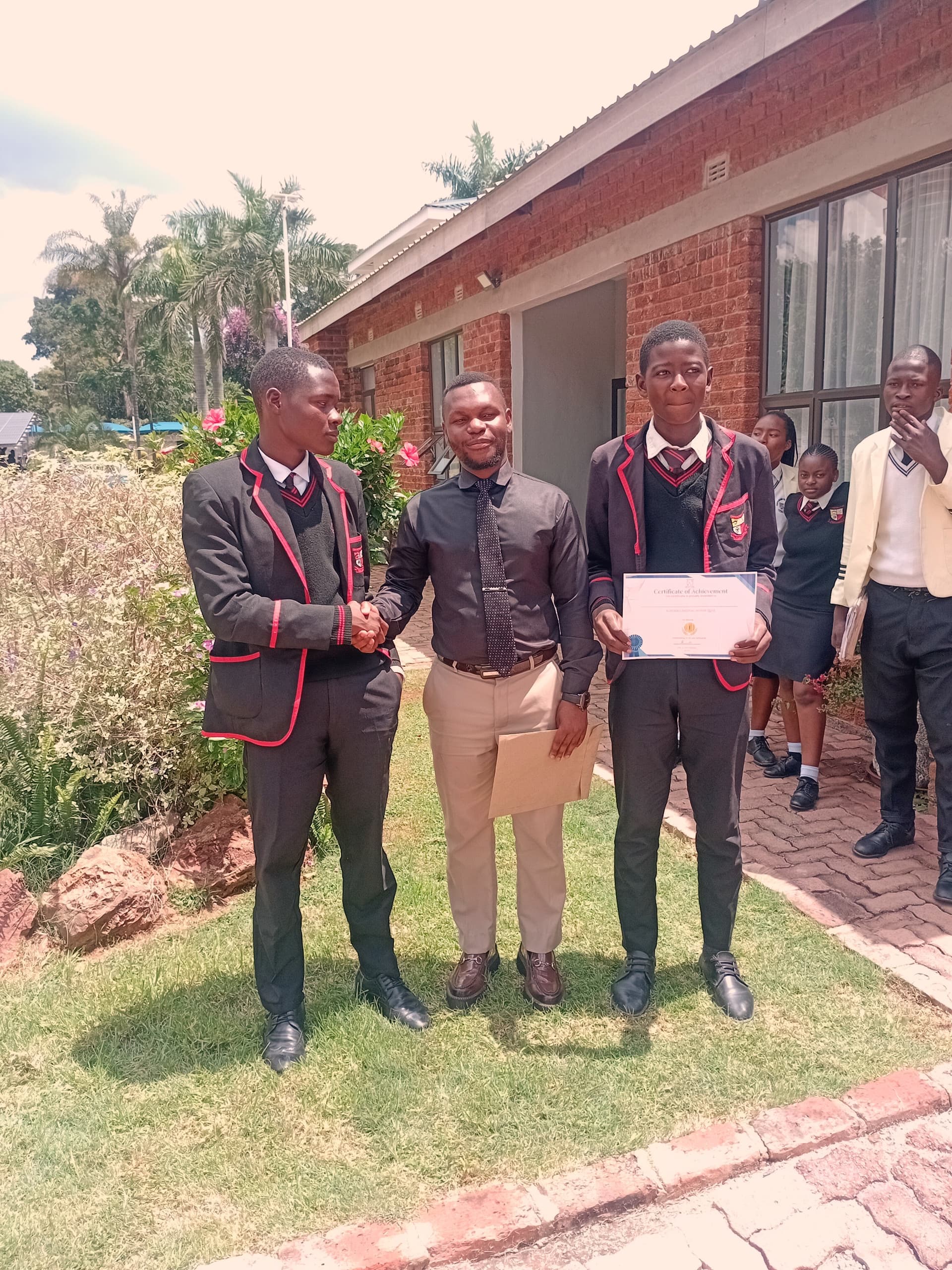 Students receiving prizes at Cliffs International College